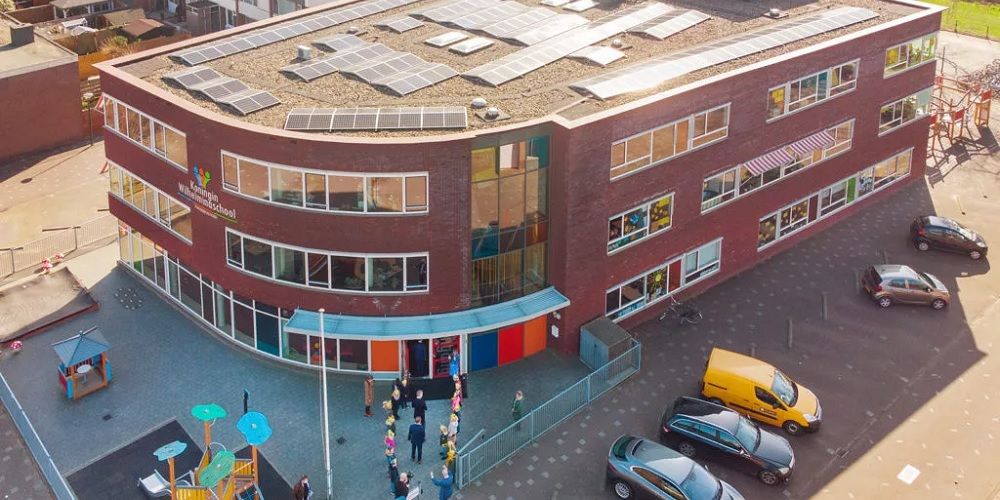 Hoe komen er zonnepanelen op alle (school)daken?